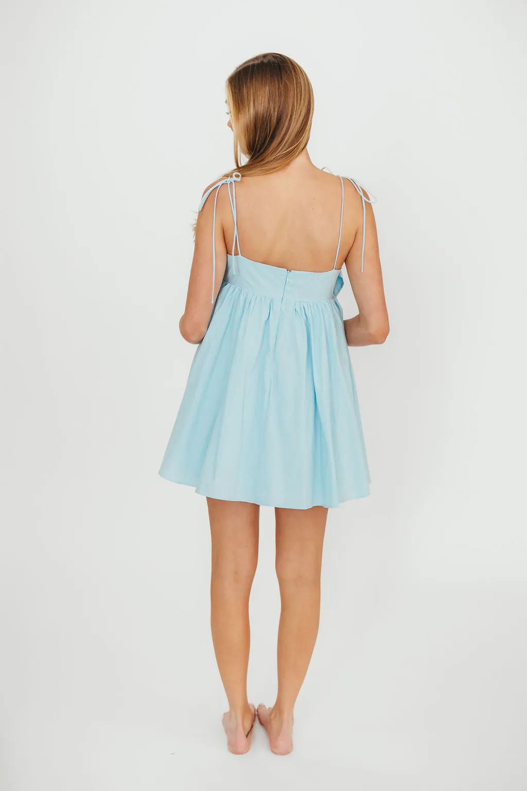 Irelyn 100% Cotton Babydoll Mini Dress with Bow Accent in Sky Blue