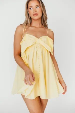 Irelyn Babydoll Mini Dress with Bow Accent in Yellow