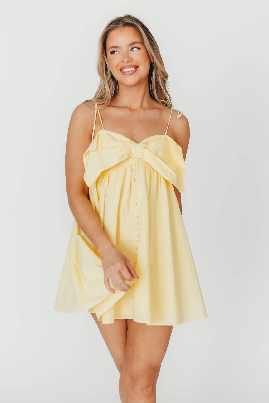 Irelyn Babydoll Mini Dress with Bow Accent in Yellow
